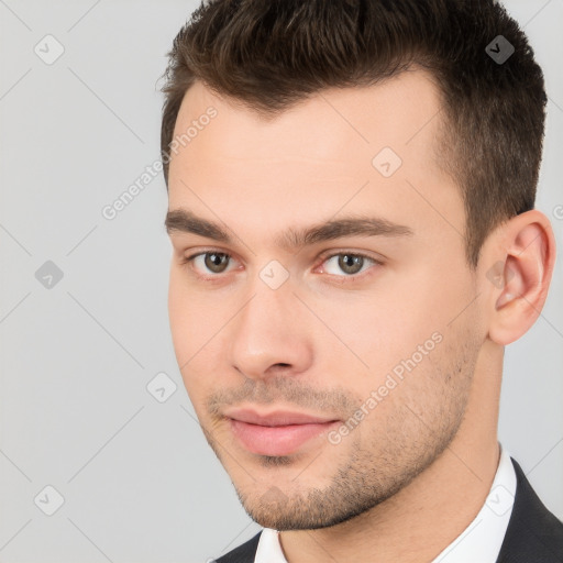 Neutral white young-adult male with short  brown hair and brown eyes