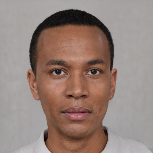 Neutral black young-adult male with short  black hair and brown eyes