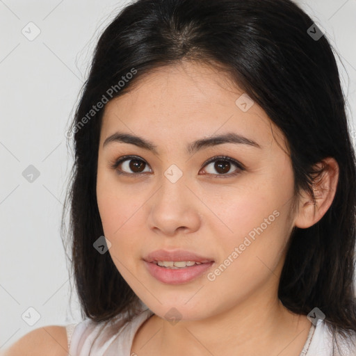 Joyful latino young-adult female with medium  brown hair and brown eyes