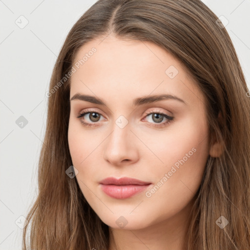 Neutral white young-adult female with long  brown hair and brown eyes