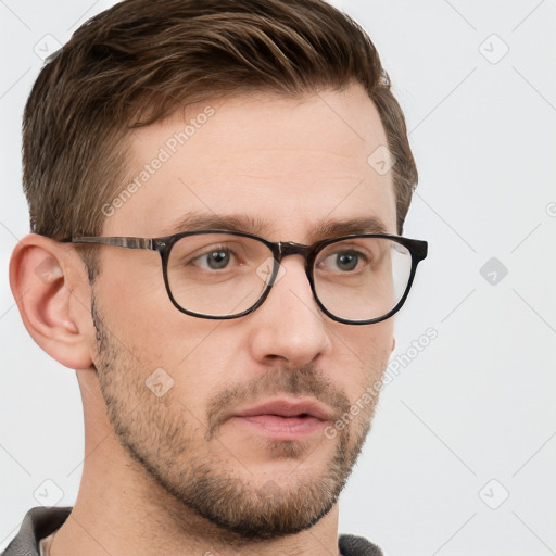 Neutral white young-adult male with short  brown hair and grey eyes