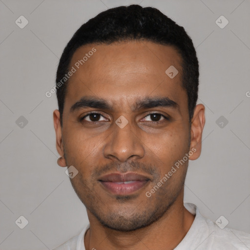 Joyful latino young-adult male with short  black hair and brown eyes