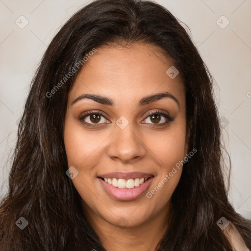 Joyful latino young-adult female with long  brown hair and brown eyes