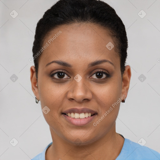 Joyful black young-adult female with short  black hair and brown eyes