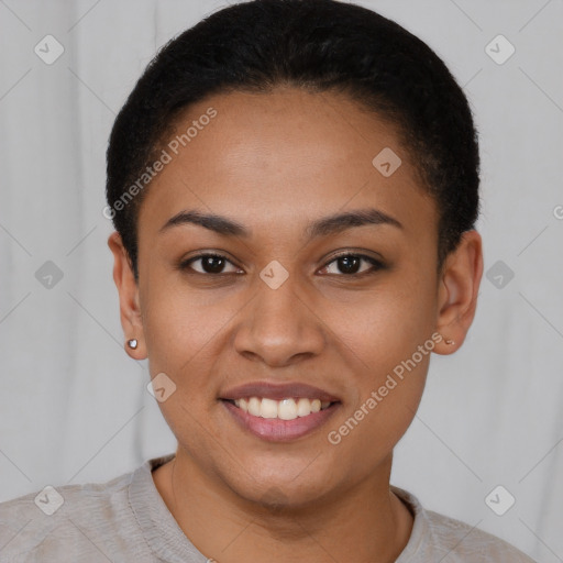 Joyful latino young-adult female with short  black hair and brown eyes