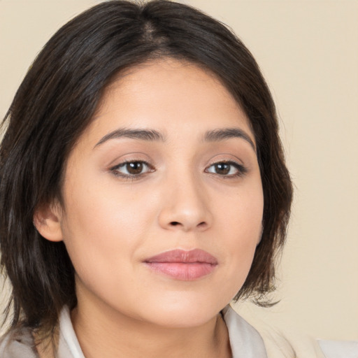 Neutral white young-adult female with medium  brown hair and brown eyes