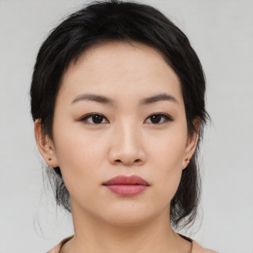 Neutral asian young-adult female with medium  black hair and brown eyes