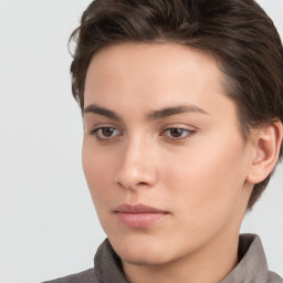 Neutral white young-adult female with short  brown hair and brown eyes