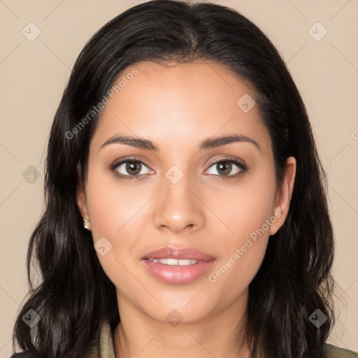 Joyful latino young-adult female with long  brown hair and brown eyes