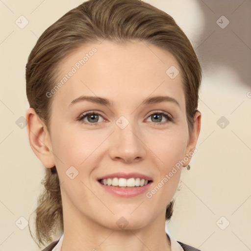 Joyful white young-adult female with medium  brown hair and grey eyes