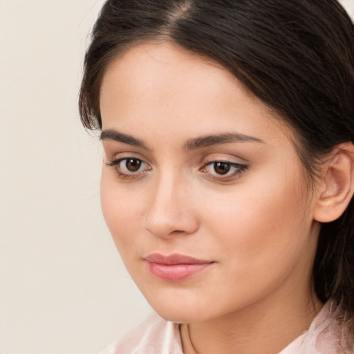 Neutral white young-adult female with medium  brown hair and brown eyes