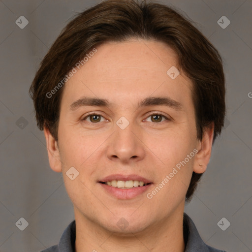 Joyful white young-adult male with short  brown hair and brown eyes