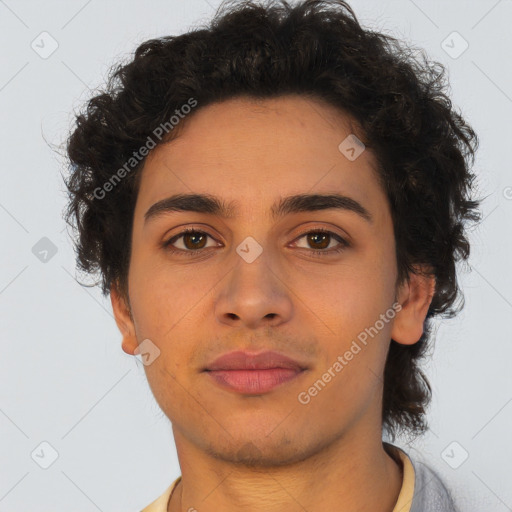 Neutral latino young-adult male with short  brown hair and brown eyes