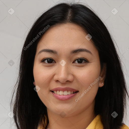 Joyful asian young-adult female with long  brown hair and brown eyes