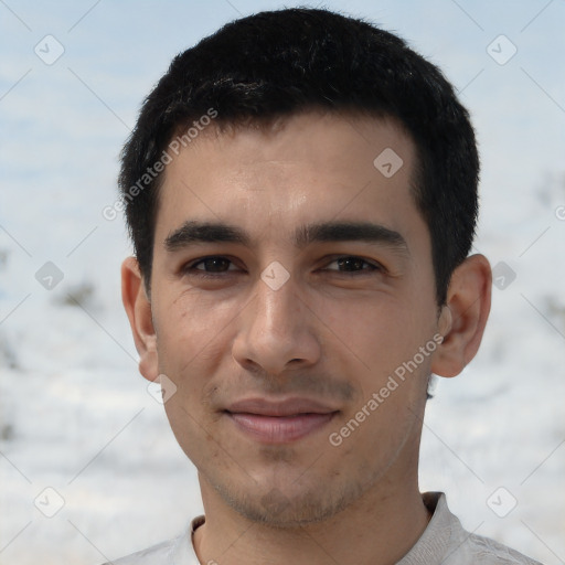 Joyful asian young-adult male with short  black hair and brown eyes