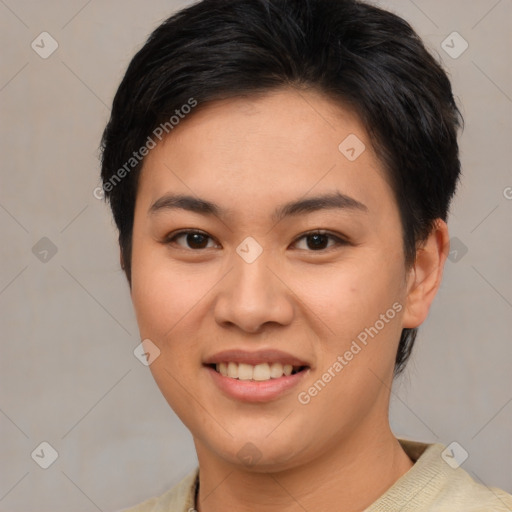 Joyful asian young-adult female with short  brown hair and brown eyes