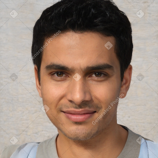 Joyful white young-adult male with short  black hair and brown eyes