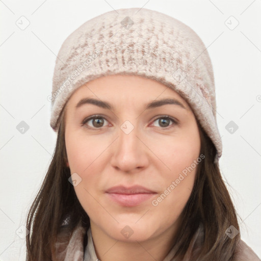 Joyful white young-adult female with long  black hair and brown eyes