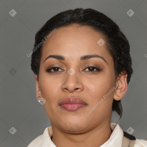 Joyful latino young-adult female with short  brown hair and brown eyes