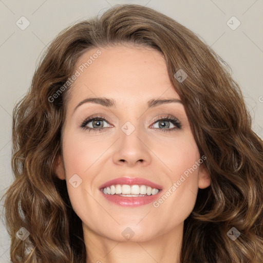 Joyful white adult female with long  brown hair and brown eyes