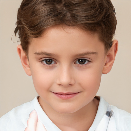 Joyful white child male with short  brown hair and brown eyes