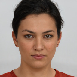 Neutral white young-adult female with short  brown hair and brown eyes