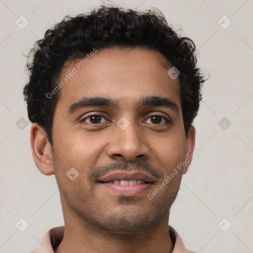 Joyful latino young-adult male with short  brown hair and brown eyes