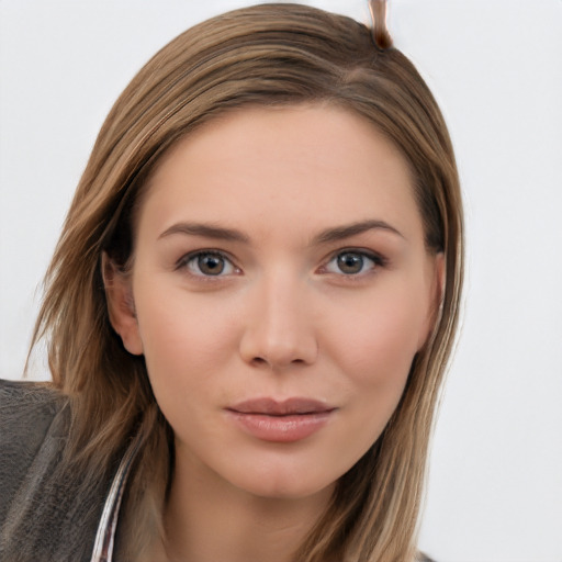 Neutral white young-adult female with long  brown hair and brown eyes