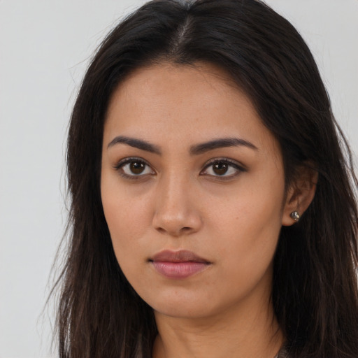 Neutral asian young-adult female with long  brown hair and brown eyes