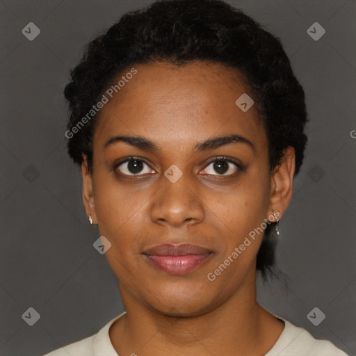 Joyful black young-adult female with short  black hair and brown eyes