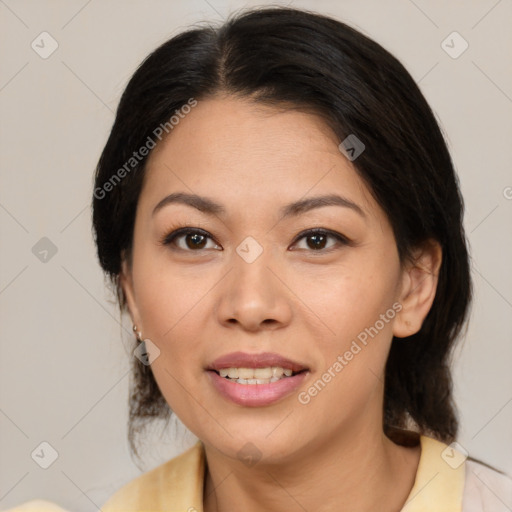 Joyful asian young-adult female with medium  brown hair and brown eyes