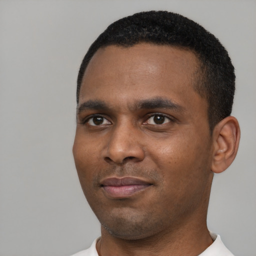 Neutral black young-adult male with short  black hair and brown eyes