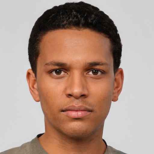 Neutral white young-adult male with short  black hair and brown eyes