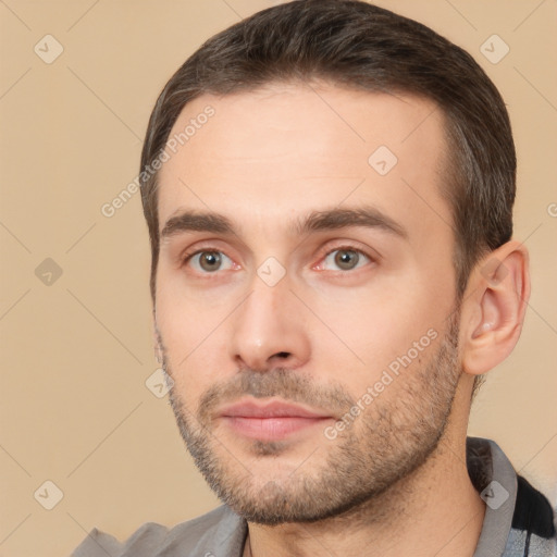 Neutral white young-adult male with short  brown hair and brown eyes