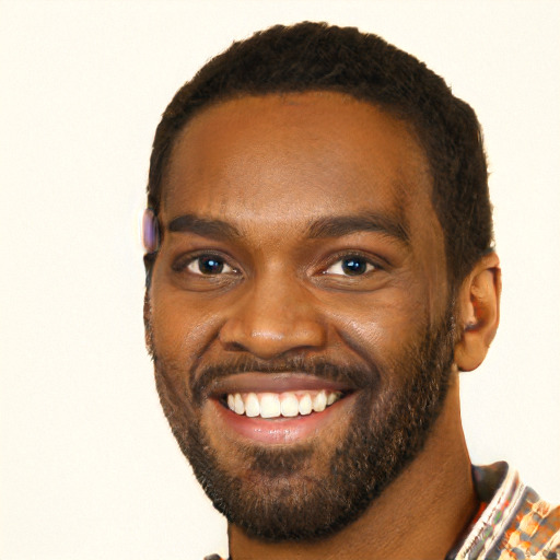 Joyful black young-adult male with short  brown hair and brown eyes