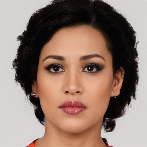 Neutral latino young-adult female with medium  black hair and brown eyes
