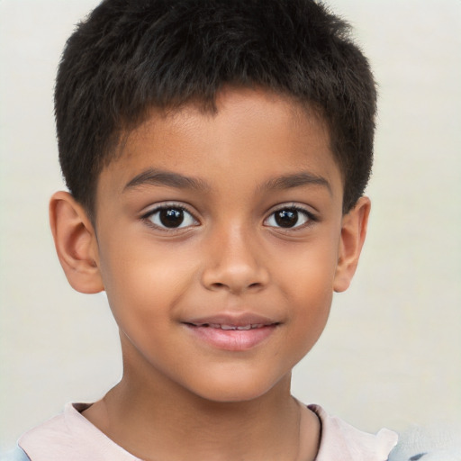 Joyful white child male with short  brown hair and brown eyes