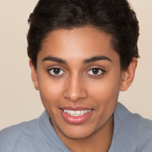 Joyful white young-adult female with short  brown hair and brown eyes