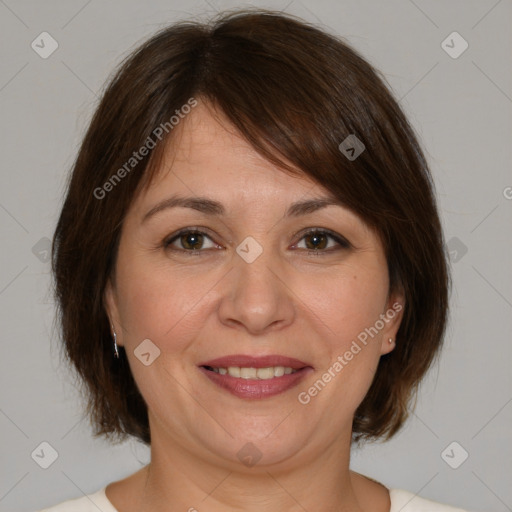 Joyful white adult female with medium  brown hair and brown eyes