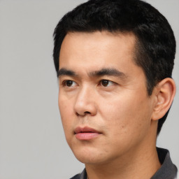 Neutral asian young-adult male with short  black hair and brown eyes