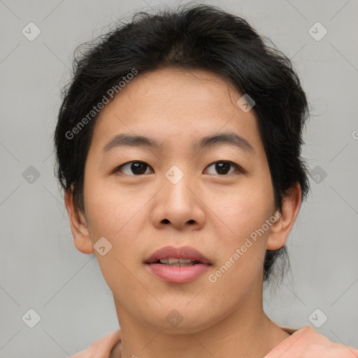 Joyful asian young-adult female with short  brown hair and brown eyes