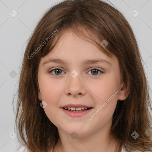 Joyful white child female with medium  brown hair and brown eyes