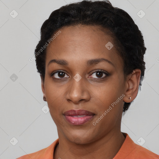 Joyful latino young-adult female with short  black hair and brown eyes