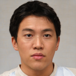 Neutral asian young-adult male with short  brown hair and brown eyes