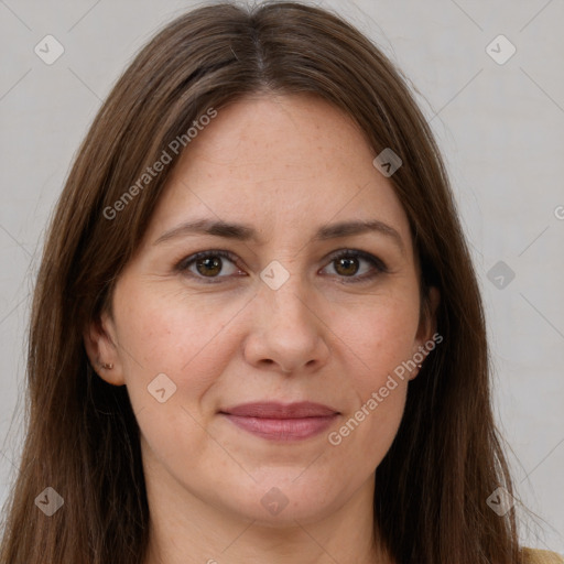 Joyful white adult female with long  brown hair and brown eyes