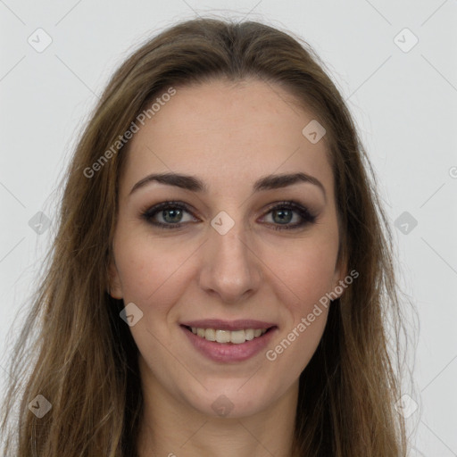 Joyful white young-adult female with long  brown hair and grey eyes