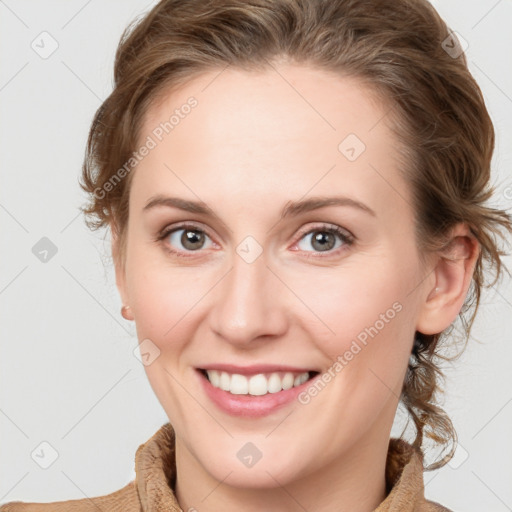 Joyful white young-adult female with medium  brown hair and blue eyes