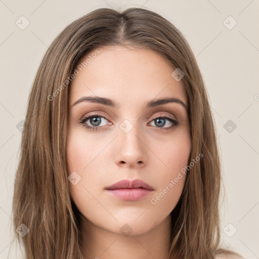 Neutral white young-adult female with long  brown hair and brown eyes