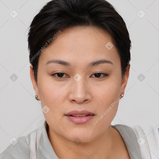 Joyful asian young-adult female with short  brown hair and brown eyes