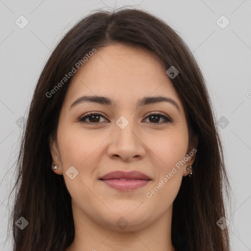 Joyful latino young-adult female with long  brown hair and brown eyes